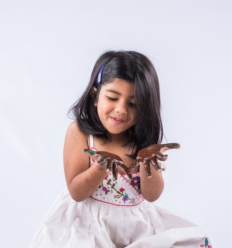 imgi_16_cute-little-indian-girl-showing-her-colourful-hand.jpeg